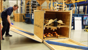 NIST dexterity cube test apparatus set up for robot manipulation evaluation.